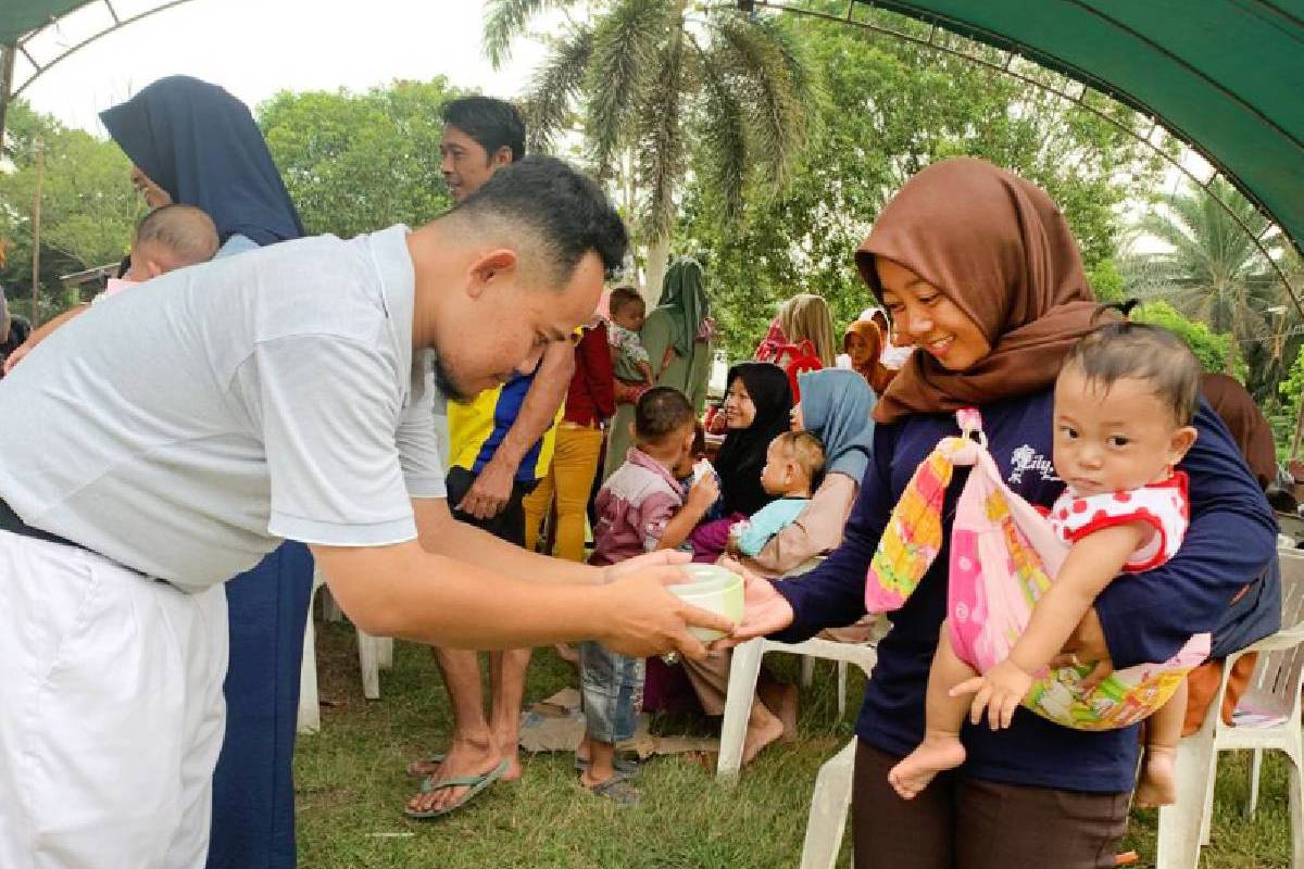 Dukungan Makanan Sehat untuk Ibu Hamil dan Balita di Kebun Semandau